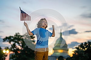 4th of July independence day in US. Kid boy with American USA flag 4th of July in Washington DC. American holiday 4th of