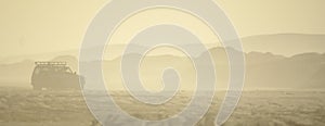 4WD CAR IN SANDSTORM