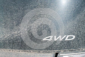 4WD sign on a very dirty car. off-road vehicle concept