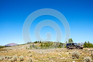 4WD vehicle driving through the mountains