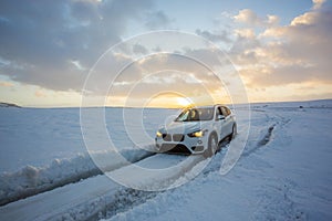 4WD vehicle going through snow