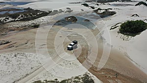 4x4 car truck at Lencois Maranhenses Brazil. Tropical scenery. Northeast Brazil.