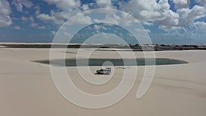 4x4 car truck at Lencois Maranhenses Brazil. Tropical scenery. Northeast Brazil.