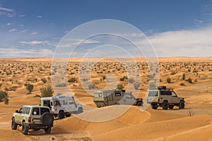 4x4 cars driving through desert