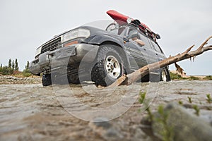 4X4 off road vehicle crossing river