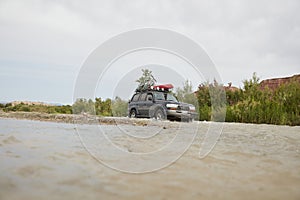 4X4 off road vehicle crossing river