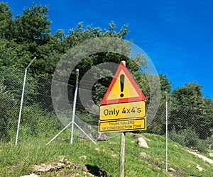 Only 4x4 road sign, just four wheels drive on the way, Sani Pass, South frica