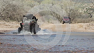4x4 side by side buggy crossing the river