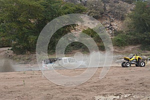 4x4 vehicle driving through Limpopo riverbed.