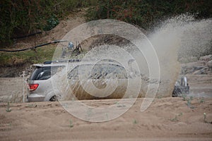 4x4 vehicle driving through Limpopo riverbed.