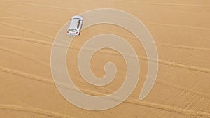 4x4 vehicle driving off road. Stock. Sand dune all-terrain car. Aerial