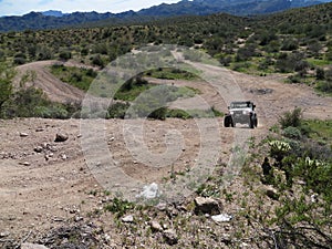 4x4 Vehicle Driving on Steep Dirt Road in Arizona