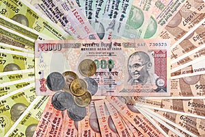 5, 10, 20, 50 ,100 and 1000 Indian rupees notes and coins