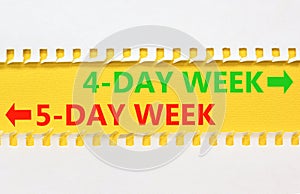 5 or 4 day week symbol. Concept word 5-day week or 4-day week on beautiful yellow paper. Beautiful white paper background.