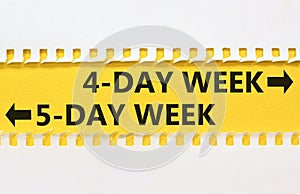 5 or 4 day week symbol. Concept word 5-day week or 4-day week on beautiful yellow paper. Beautiful white paper background.