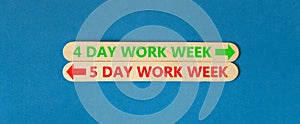 5 or 4 day week symbol. Concept word 5 day work week or 4 day work week on beautiful wooden stick. Beautiful blue table blue