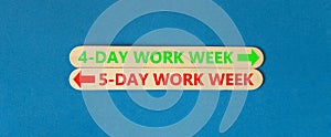 5 or 4 day week symbol. Concept word 5-day work week or 4-day work week on beautiful wooden stick. Beautiful blue table blue