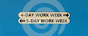 5 or 4 day week symbol. Concept word 5-day work week or 4-day work week on beautiful wooden stick. Beautiful blue table blue