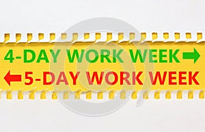 5 or 4 day week symbol. Concept word 5-day work week or 4-day work week on beautiful yellow paper. Beautiful white paper