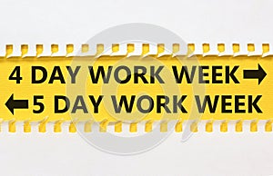 5 or 4 day week symbol. Concept word 5 day work week or 4 day work week on beautiful yellow paper. Beautiful white paper