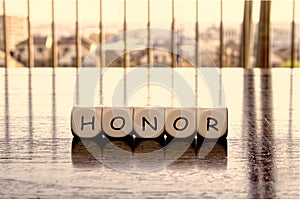 5 dices forming the Word honor