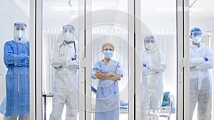 5 of Dortor, Nurse and patient looking out in the quarantine room