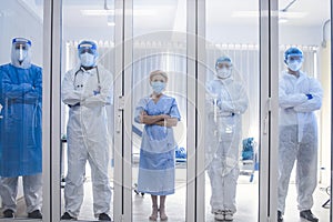 5 of Dortor, Nurse and patient looking out in the quarantine room