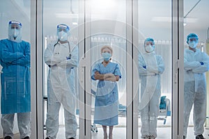 5 of Dortor, Nurse and patient looking out in the quarantine room