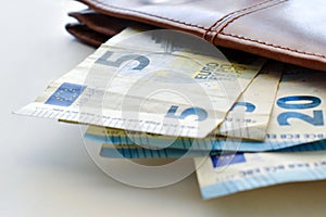 5 Euro banknotes and 20 Euro banknotes.