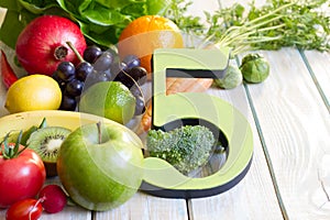 5 Five a day portion size with fresh fruits and vegetables healthy diet lifestyle concept