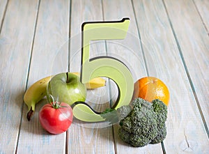 5 Five a day portion size with fresh fruits and vegetables healthy diet lifestyle concept