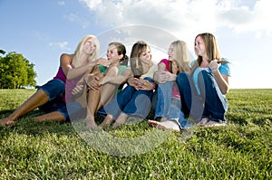 5 Girls sitting together and laughing