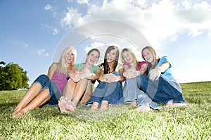 5 Girls sitting together and laughing