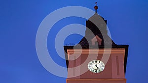 5 oclock on the tower clock under the blue sky