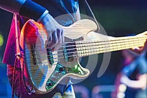 5-string bass player during a live show