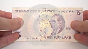 5 Turkish lira in hands, turkish money, bank of turkey