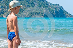 5 years old boy in swimming trunks