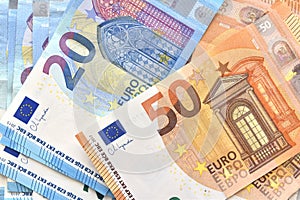 50 and 20 Euro banknotes background.