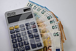 50 and 20 euro banknotes with calculator