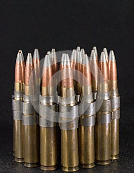 .50 Caliber bullets on black
