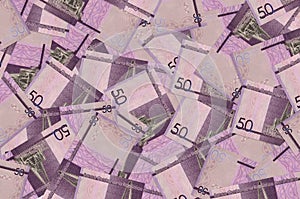 50 Dominican pesos bills lies in big pile. Rich life conceptual background