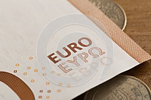 50 euro notes and coins- Image