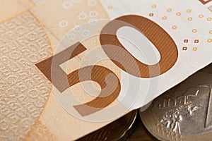 50 euro notes and coins- Image