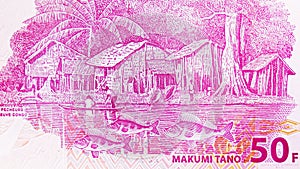 50 Franks banknote, Bank of Congo, closeup bill fragment shows Fishermen village on Congo river