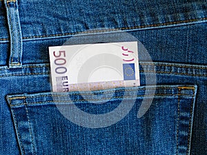 500 euro banknote in blue jeans pocket top view with copy space.