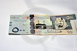 500 Saudi Riyal banknote, with image of Kaaba and King AbdulAziz, Saudi Arabia 500 Riyals cash money selective focus