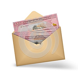 5000 Rwandan franc notes inside an open brown envelope
