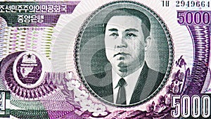 5000 Won banknote, Bank of Korea, closeup bill fragment shows Portrait of Kim Il Sung