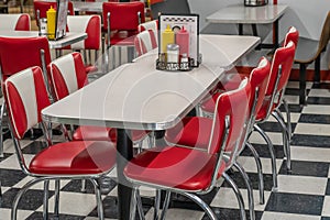 50s style diner with red and white chairs