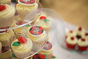 50th Bithday cup cakes with tarten and roses